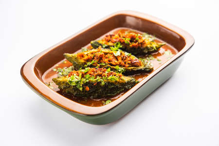 Bharwa Karela masala or stuffed bitter melon curry recipe