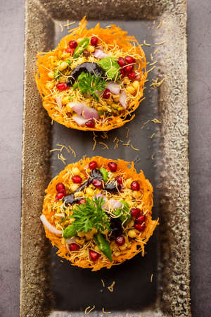 Aloo Tokri Chaat or Potato Basket stuffed chat or katori chatの写真素材