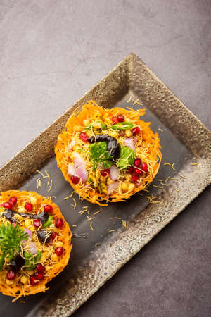 Aloo Tokri Chaat or Potato Basket stuffed chat or katori chatの写真素材