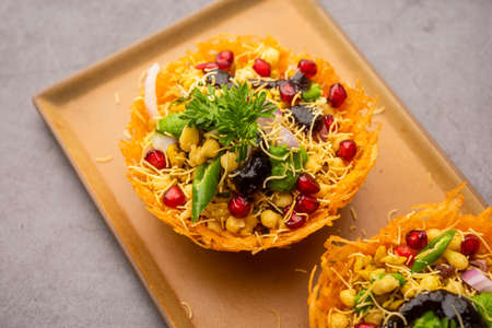 Aloo Tokri Chaat or Potato Basket stuffed chat or katori chatの写真素材