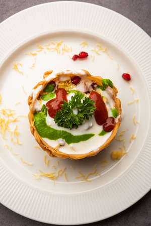 Aloo Tokri Chaat or Potato Basket stuffed chat or katori chatの写真素材