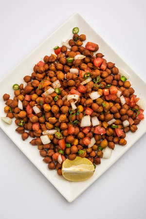 Chola Chana Chaat or black chana chaat with lemonの写真素材
