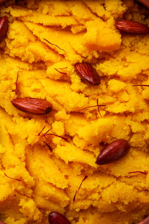 Badam Halwa or sheera also known as Almond Halwa is a traditional Indian sweet dish prepared blending milk and almondsの写真素材