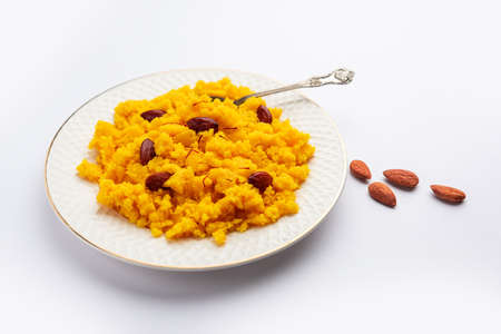 Badam Halwa or sheera also known as Almond Halwa is a traditional Indian sweet dish prepared...