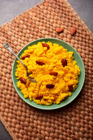 Badam Halwa or sheera also known as Almond Halwa is a traditional Indian sweet dish prepared blending milk and almondsの写真素材