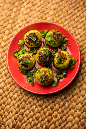 Indian style Tinda or Tinde ki Sabzi also called Indian squash, round melon, Indian round gourd or Indian baby pumpkin, stuffed, stir fried dry or curry recipeの写真素材