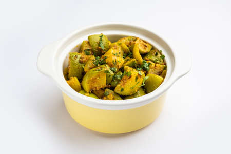 Indian style Tinda or Tinde ki Sabzi also called Indian squash, round melon, Indian round gourd or Indian baby pumpkin, stuffed, stir fried dry or curry recipeの写真素材