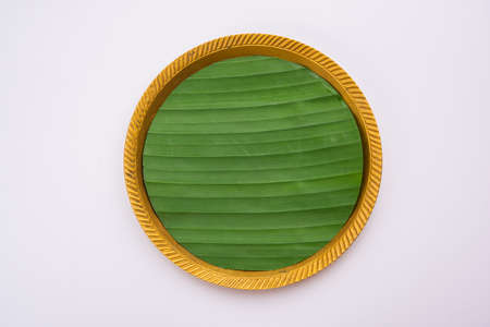 banana leaf on blank plate for edit food or subject onの写真素材