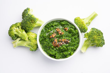 Fresh broccoli chutney or paste, puree in the bowl with raw pieces