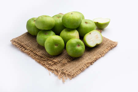 Raw Tinda, tinde also called dhemse, Apple Gourd, Baby Pumpkin, Indian Squash Round Melonの写真素材