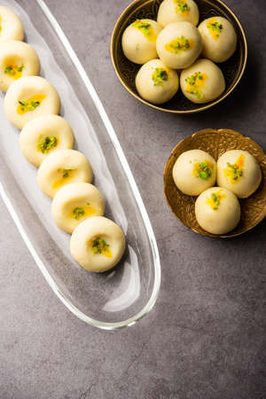 Sandesh or shondesh is a dessert, originating from the Bengal, India, created with milk and sugarの写真素材