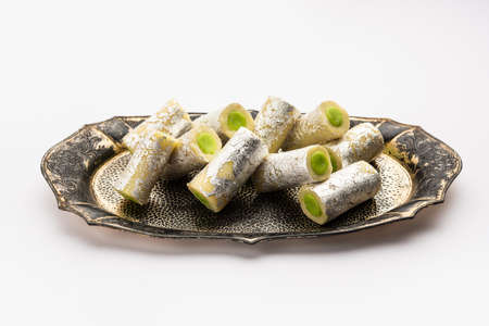 Kaju Pista Roll Or Cashew Pistachio Rolls Mithai or sigar, Indian sweet or dessert for festivals
