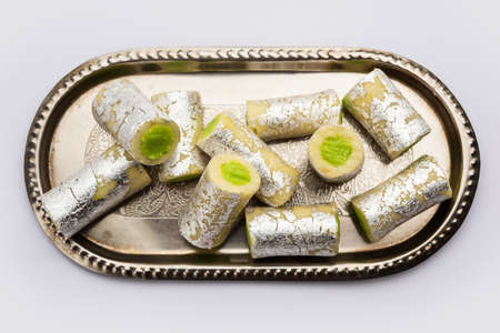 Kaju Pista Roll Or Cashew Pistachio Rolls Mithai or sigar, Indian sweet or dessert for festivalsの写真素材