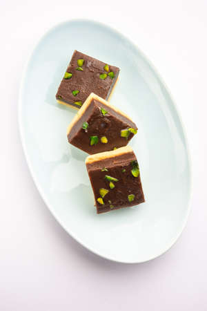 Choco Vanilla PateesaÂ or chocolate mawa barfi or or two layered burfi, Indian sweet or dessert