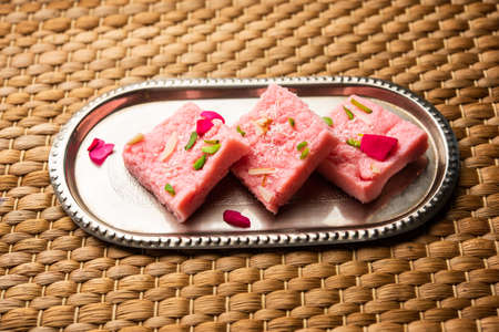 Rose Kalakand pink barfi or burfi also known as flavoured Mishri Mava Or Khoa Milkcake mithaiの写真素材
