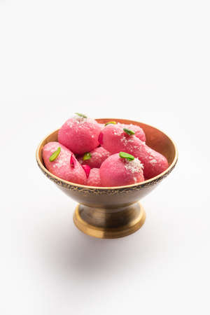 Pink Chumchum or rose flavoured chum chum or cham cham, indian and pakistani sweetの写真素材