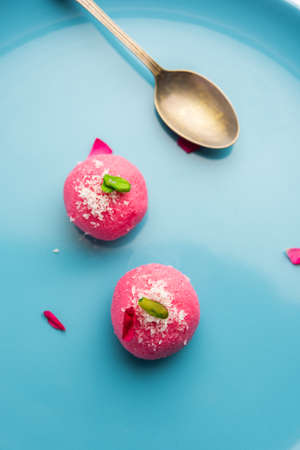 Delicious Pink Chumchum or rose flavour cham cham or Rasgulla or Rasagola, Rosogola, Rosogollaの写真素材