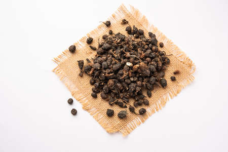 Ayurvedic Nagarmotha - Cyperus Scariosus or Cypriol in a bowl or heap