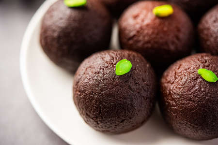 Indian Sweet Food Sweet Black Gulab Jamun Also Known as Kala Jamun, Black Jamun or Dry Kala Jam