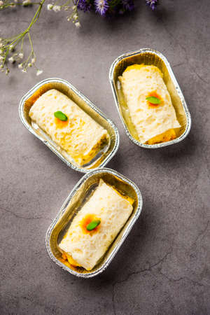 Malai Chop or Cream sandwich made using filling Rasgulla or Gulab jamun sweet is a Bengali sweetの写真素材