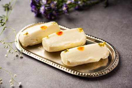 Malai Chop or Cream sandwich made using filling Rasgulla or Gulab jamun sweet is a Bengali sweet