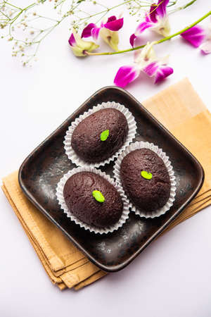Indian Sweet Food Sweet Black Gulab Jamun Also Known as Kala Jamun, Black Jamun or Dry Kala Jam