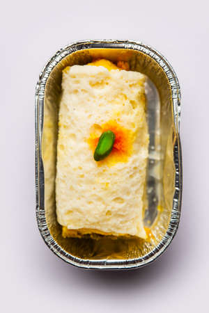 Malai Chop or Cream sandwich made using filling Rasgulla or Gulab jamun sweet is a Bengali sweetの写真素材