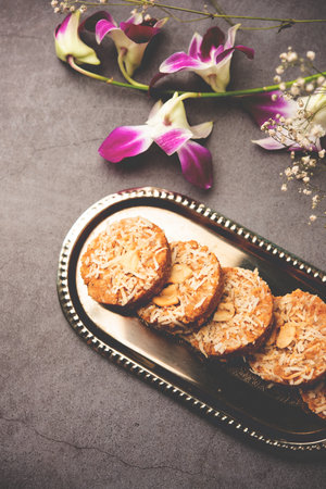 Amrit peda or Amrut pedha or pera is an Indian sweet made from milk and sugar with coconut topping