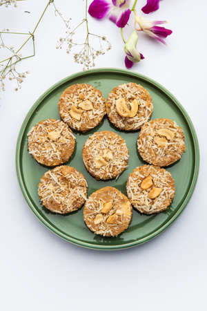 Amrit peda or Amrut pedha or pera is an Indian sweet made from milk and sugar with coconut toppingの写真素材