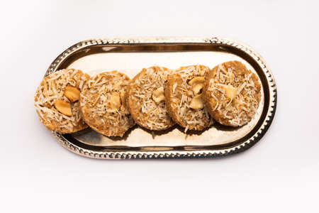 Amrit peda or Amrut pedha or pera is an Indian sweet made from milk and sugar with coconut toppingの写真素材