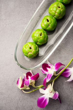 Sitafal peda or pera or custard apple shape designer sweet mithai barfi or burfiの写真素材