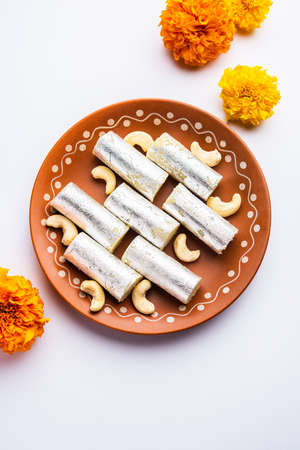 Kaju Roll mithai - A royal Traditional sweet made from cashew powder and mawa with sugarの写真素材