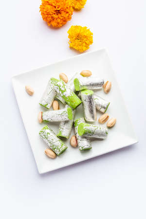 Pista Roll Or Pistachio Rolls Mithai or sigar, Indian sweet or dessert for festivalsの写真素材