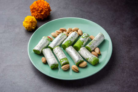 Pista Roll Or Pistachio Rolls Mithai or sigar, Indian sweet or dessert for festivalsの写真素材