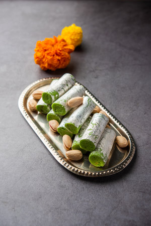 Pista Roll Or Pistachio Rolls Mithai or sigar, Indian sweet or dessert for festivalsの写真素材