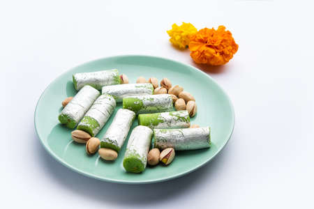 Pista Roll Or Pistachio Rolls Mithai or sigar, Indian sweet or dessert for festivalsの写真素材