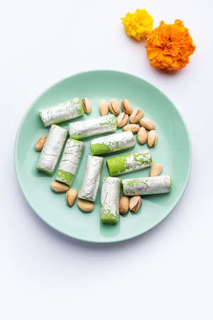 Pista Roll Or Pistachio Rolls Mithai or sigar, Indian sweet or dessert for festivalsの写真素材