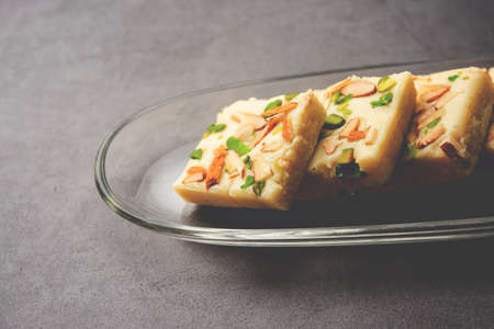 Milk powder barfi also known as Mava burfi, white Khoya burfi or Barfee, Indian Sweet food
