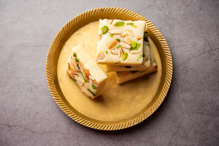 Milk powder barfi also known as Mava burfi, white Khoya burfi or Barfee, Indian Sweet food