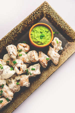 vegetarian soya malai chap made usingÂ soya chaapÂ withÂ whiteÂ creamy gravy