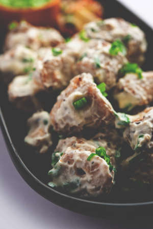 vegetarian soya malai chap made usingÂ soya chaapÂ withÂ whiteÂ creamy gravy