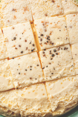 Kharvas or Cheek, Chik, Bari, Pis or Junnu is a sweet dairy product made from bovine colostrum