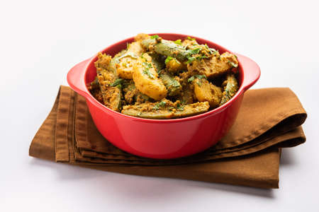 Aloo Potol or Dalna Recipe is a traditional sabzi from bengal made with potato & pointed gourdの写真素材
