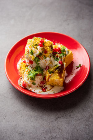 Khaman Dhokla chaat is a very simple and refreshing fusion chaat recipe made using leftover dhoklaの写真素材