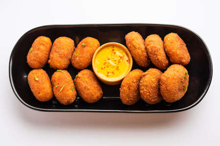 Macher Chop - Bengali style fish cutlet or pakora, a popular festival snack from west Bengal