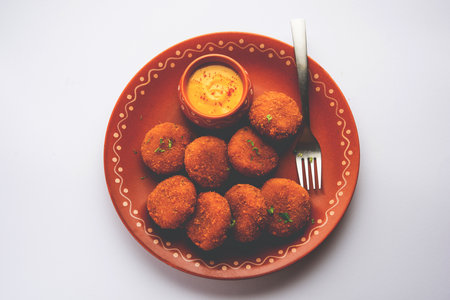 Macher Chop - Bengali style fish cutlet or pakora, a popular festival snack from west Bengal