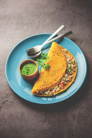 Paneer stuffed Besan chilla or Cheela made using chickpea flour with cottage cheese stuffingの写真素材