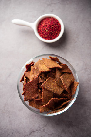 Ragi Chips or Nachni or finger millet wafers, Indian healthy snackの写真素材