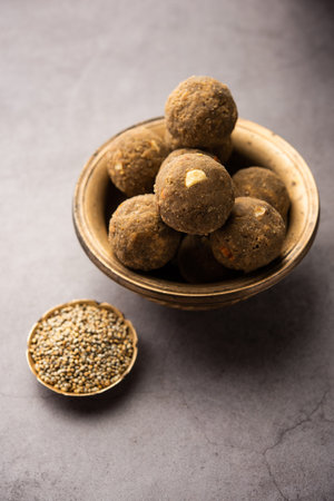 Bajra Atta Ladoo or kuler laddoo - Millet Flour Laddu, a popular winter sweet snack food from Indiaの写真素材