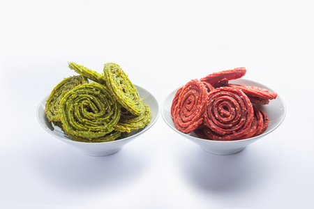 Palak Beetroot chakli or murukku made using spinach and beetrootの写真素材